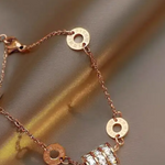 Sparkling Roman Numeral Charm Bracelet
