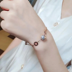Sparkling Roman Numeral Charm Bracelet